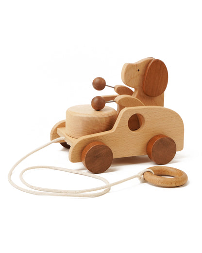 Wooden dog pull toy with a drum, sapele wheels, pull cord and wooden ring handle