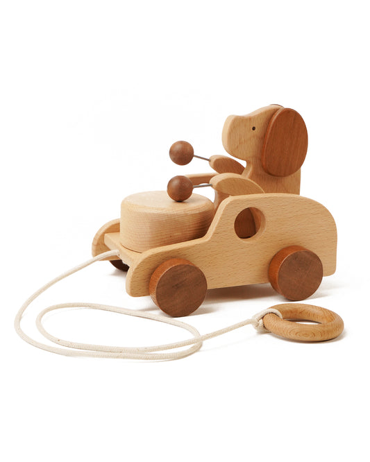Wooden dog pull toy with a drum, sapele wheels, pull cord and wooden ring handle